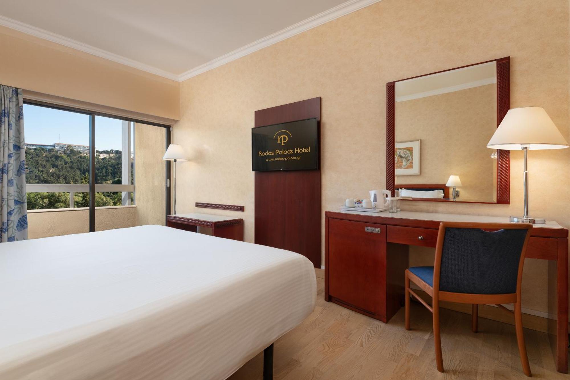 Rodos Palace Hotel Ixiá Kültér fotó A room at the hotel